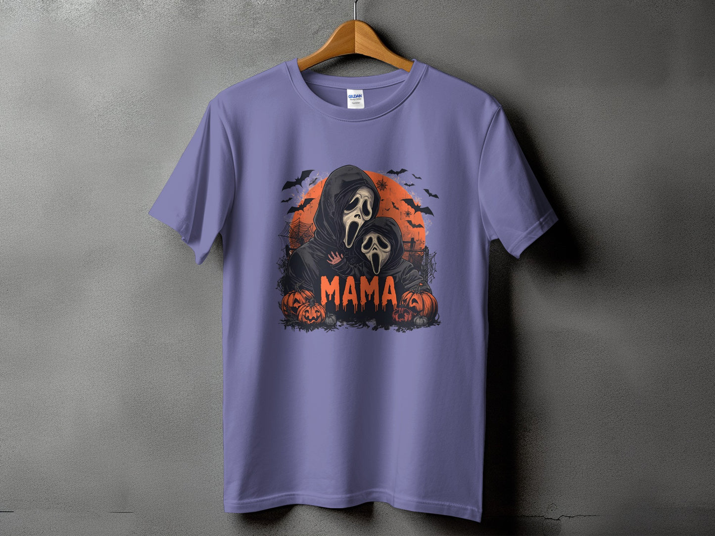 Purple t-shirt with "Mama" text and two ghost characters surrounded by pumpkins.