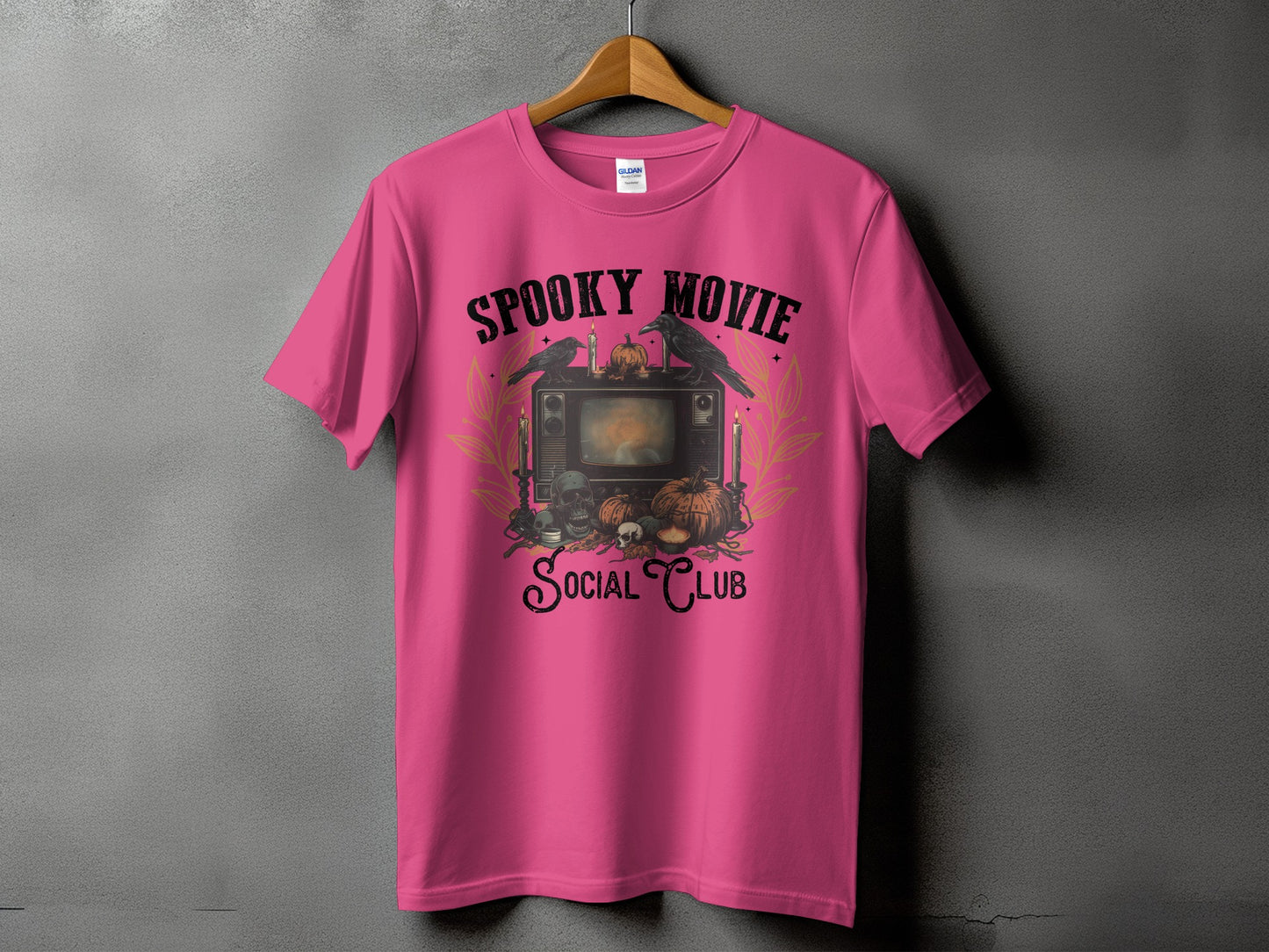 Pink t-shirt with "Spooky Movie Social Club" text and Halloween graphic.