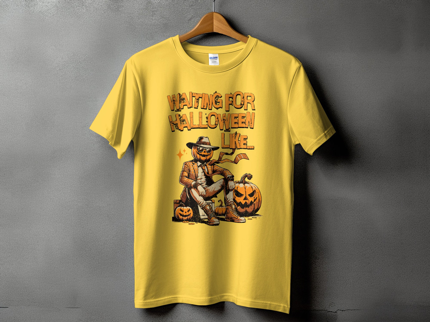 Yellow t-shirt with "Waiting For Halloween Like..." text and a pumpkin character.