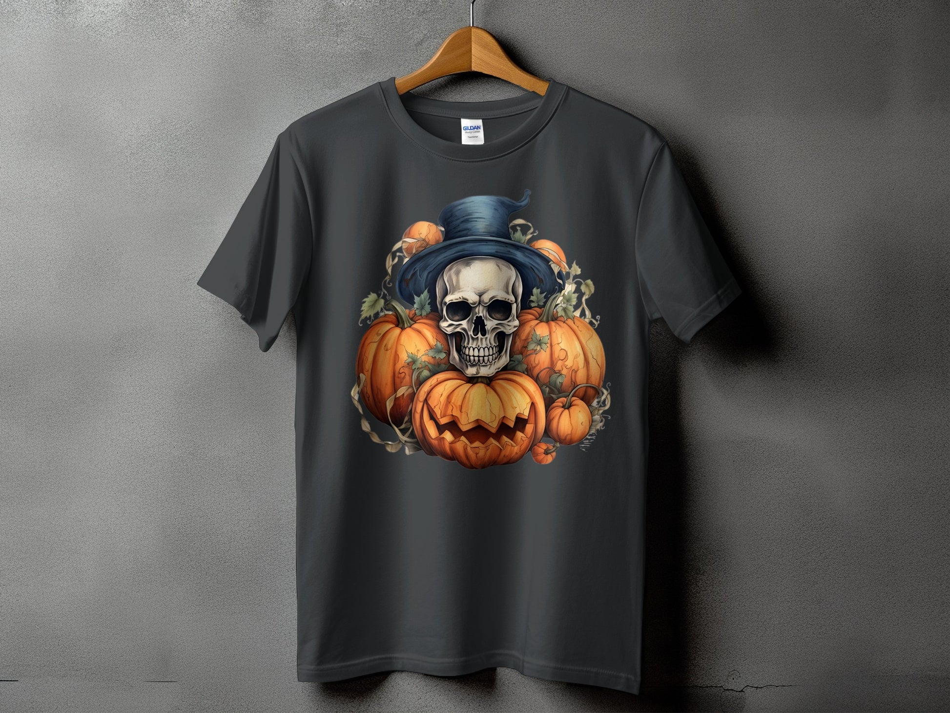 Skull wearing a hat surrounded by carved pumpkins on a dark gray t-shirt.
