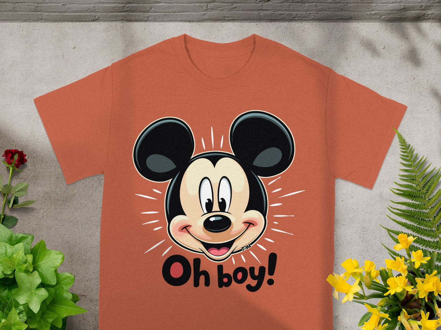 Orange t-shirt with a smiling Mickey Mouse graphic and "Oh boy!" text.