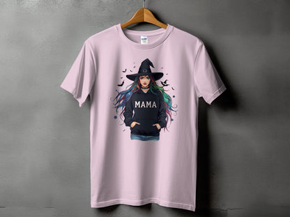 Pink t-shirt with graphic of a witch wearing a black hoodie with the word "MAMA".