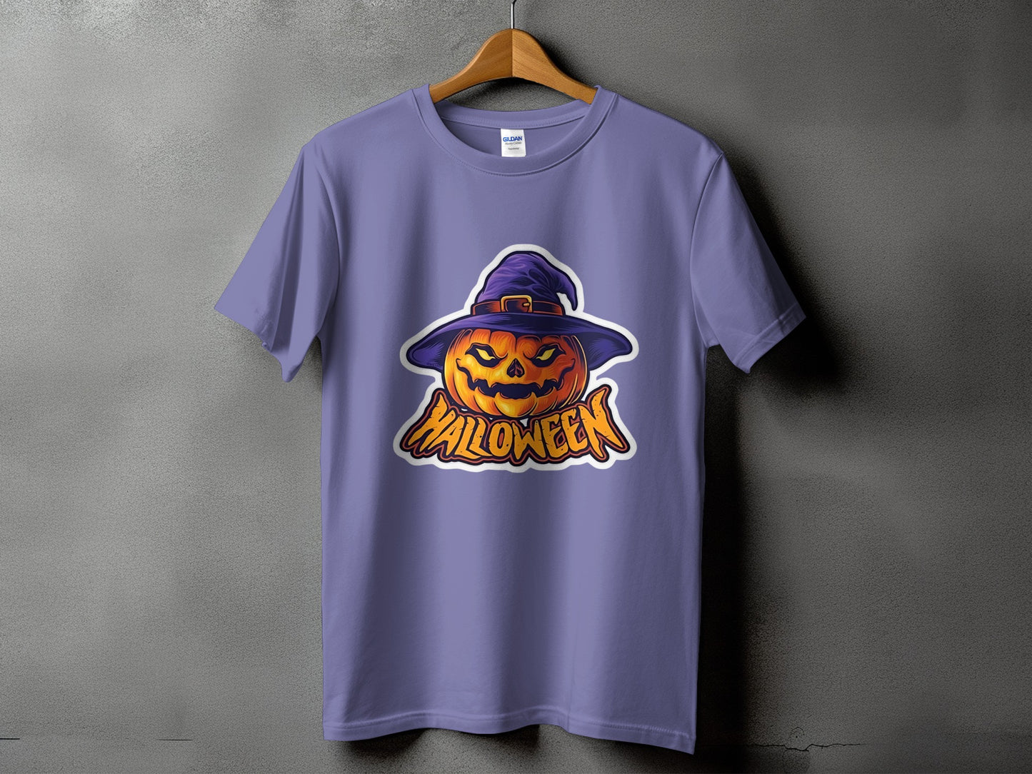 Purple t-shirt with a Halloween pumpkin wearing a witch hat graphic.