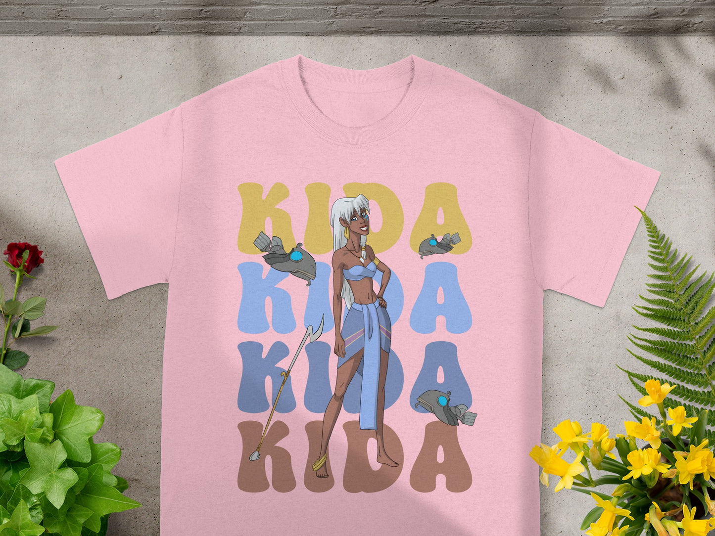 Pink t-shirt with Kida graphic and "Kida Kida" text.