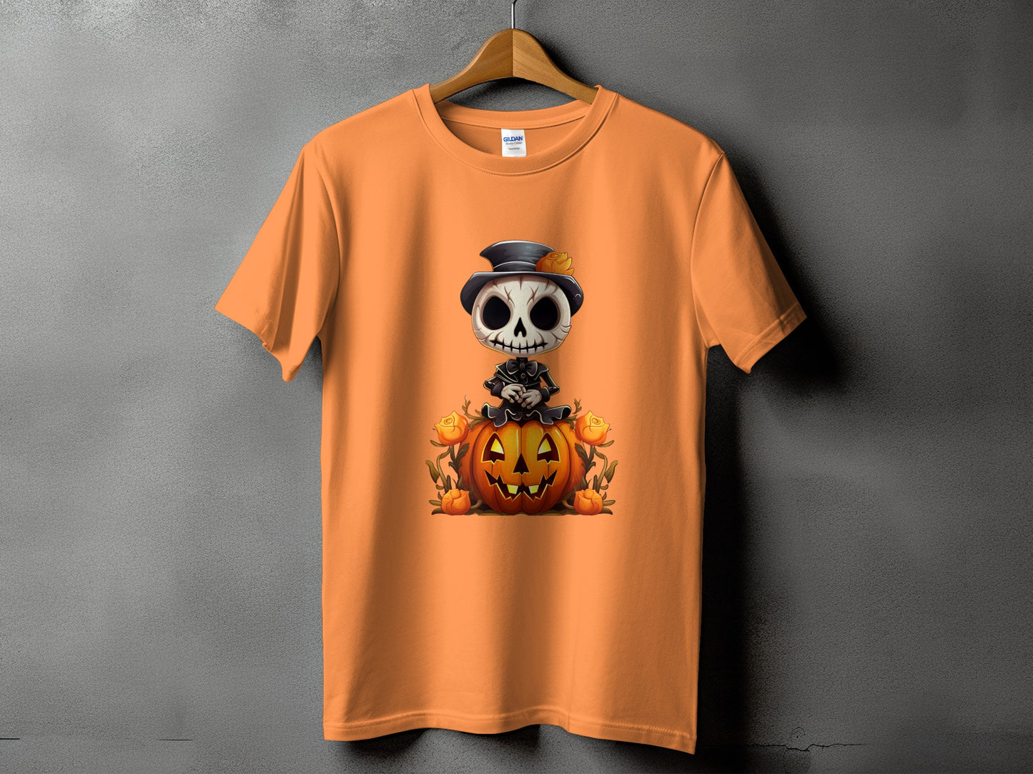 Orange t-shirt with a skeleton character sitting on a jack-o'-lantern with roses.