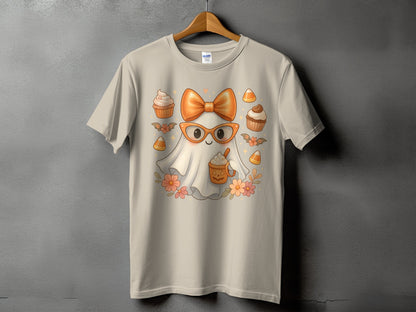 Light tan t-shirt with a cute ghost wearing glasses and an orange bow.
