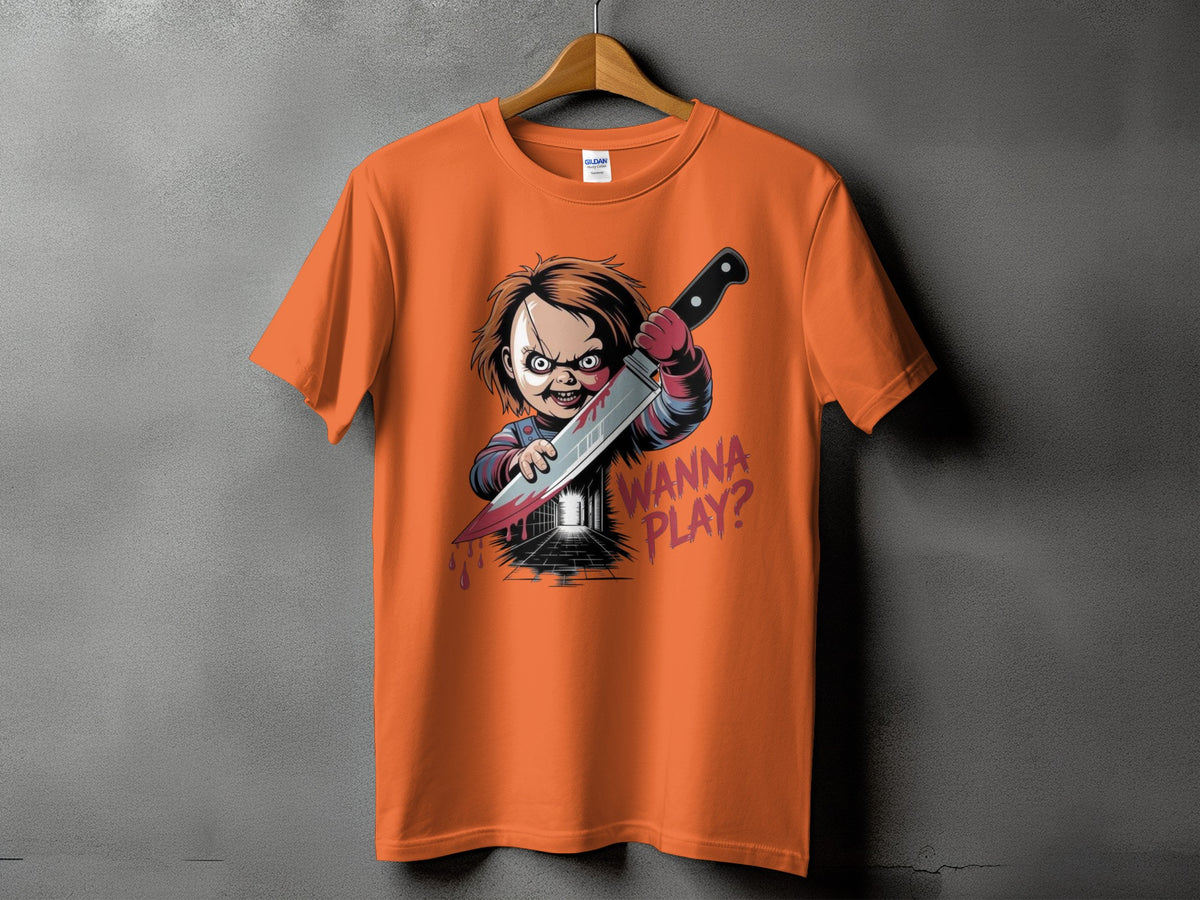 Orange t-shirt with Chucky holding a bloody knife and text "WANNA PLAY?".