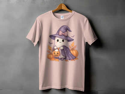 Pink t-shirt featuring a cute ghost in a witch hat holding a jack-o'-lantern.