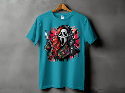Teal t-shirt with a horror mask and knife graphic, featuring tattoos and bats.