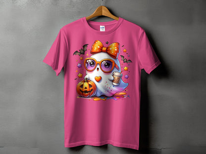 Cute ghost with pumpkin and coffee cup graphic on a pink t-shirt.
