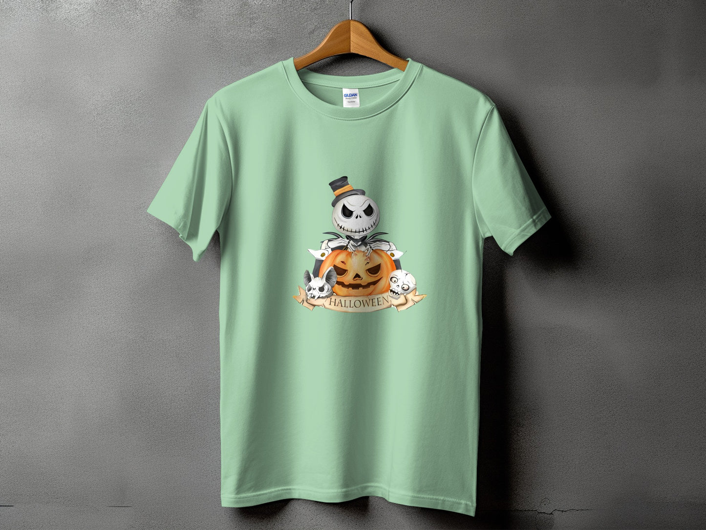 Light green t-shirt with Jack Skellington, pumpkin, and skulls Halloween graphic.