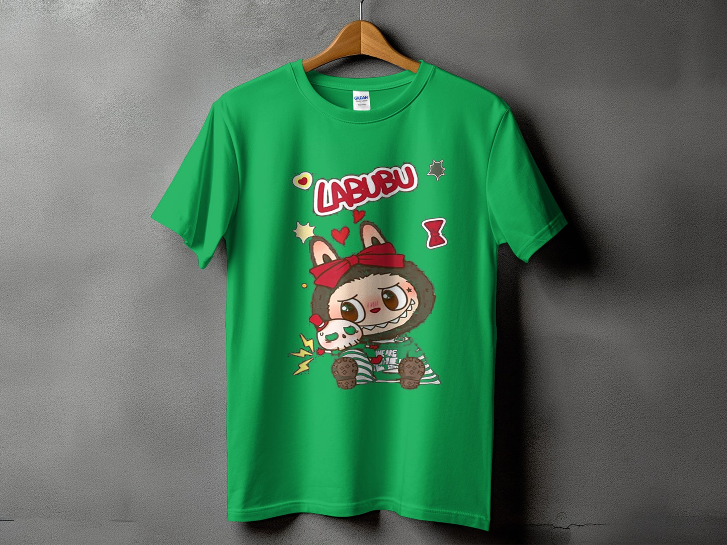 Green t-shirt with a cartoon character named Labubu holding a smaller skull.