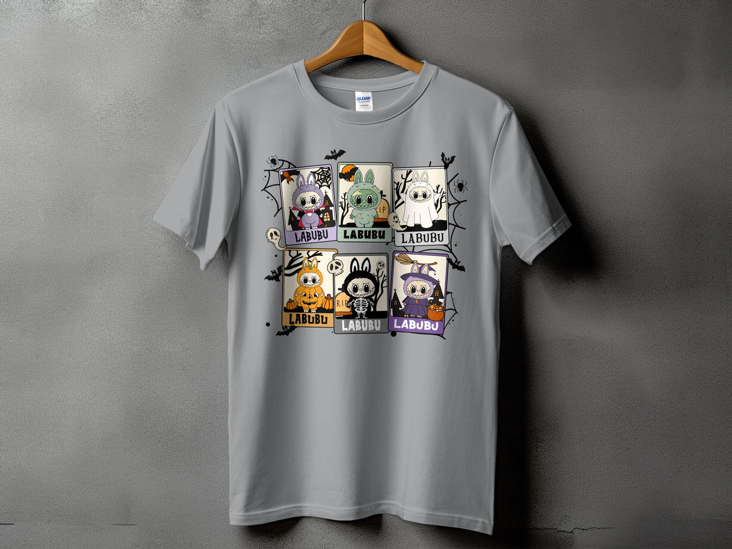 Grey t-shirt with six Halloween-themed Labubu character panels.