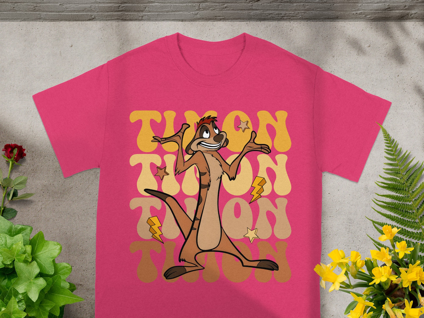 Timon from The Lion King on a pink t-shirt.