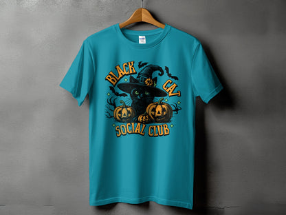 Teal t-shirt with "Black Cat Social Club" Halloween graphic featuring a cat in a witch hat.