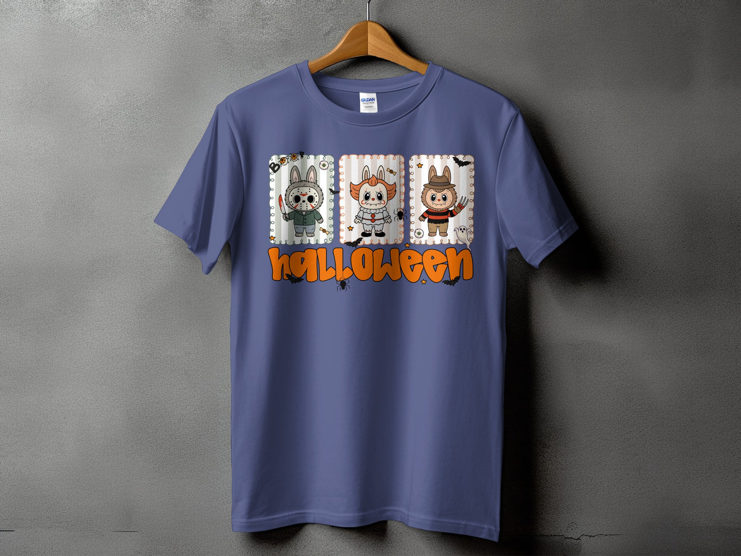 Purple t-shirt with Halloween graphic featuring three costumed bunnies and text.