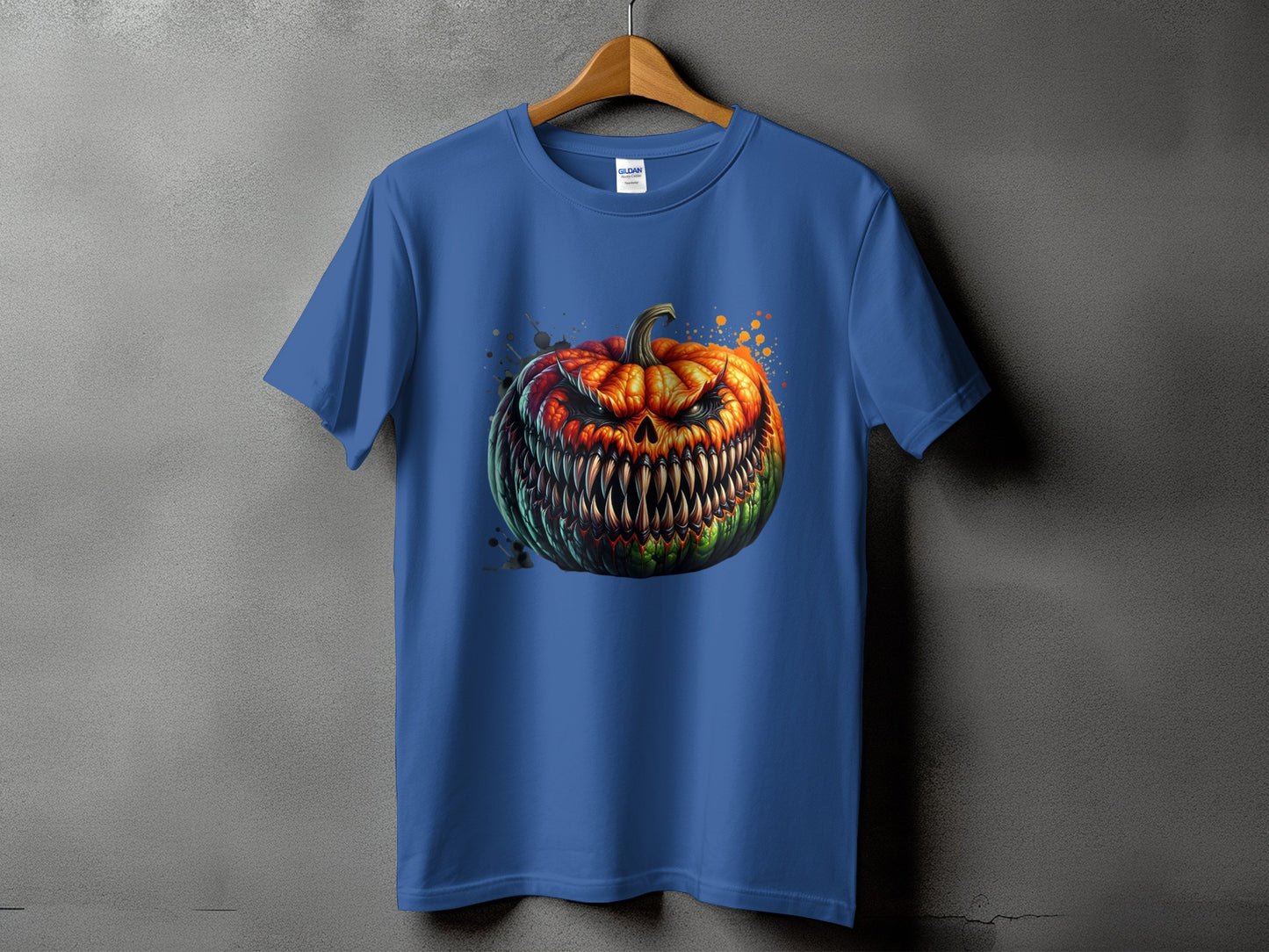 Blue t-shirt with a detailed, menacing jack-o'-lantern design and paint splatters.
