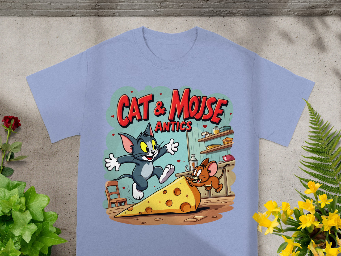 Tom and Jerry jumping over a large wedge of cheese, Cat & Mouse Antics t-shirt.