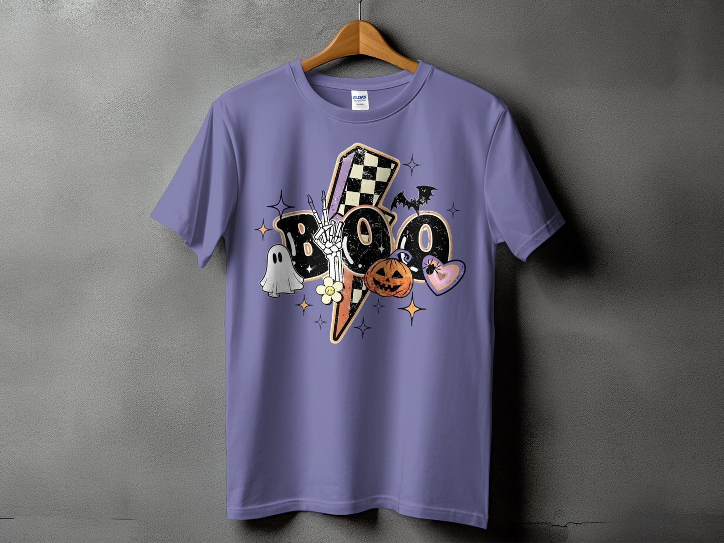 Lavender t-shirt with "Boo" graphic featuring a skeleton hand, ghost, pumpkin, and hearts.