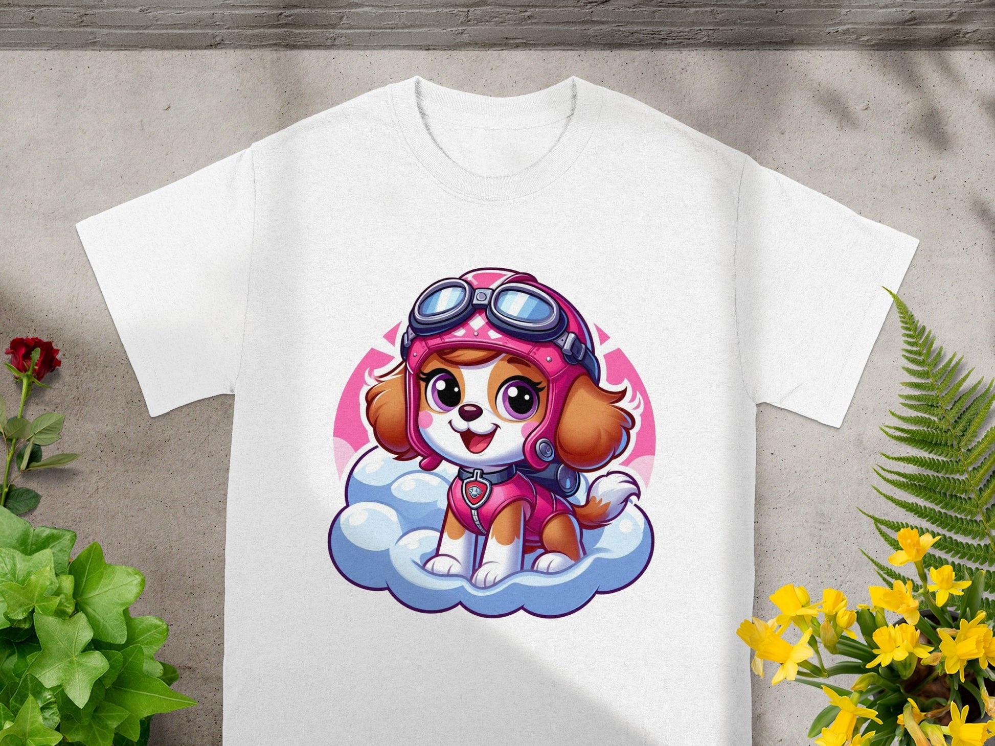 White t-shirt with cartoon Skye from Paw Patrol sitting on a cloud.