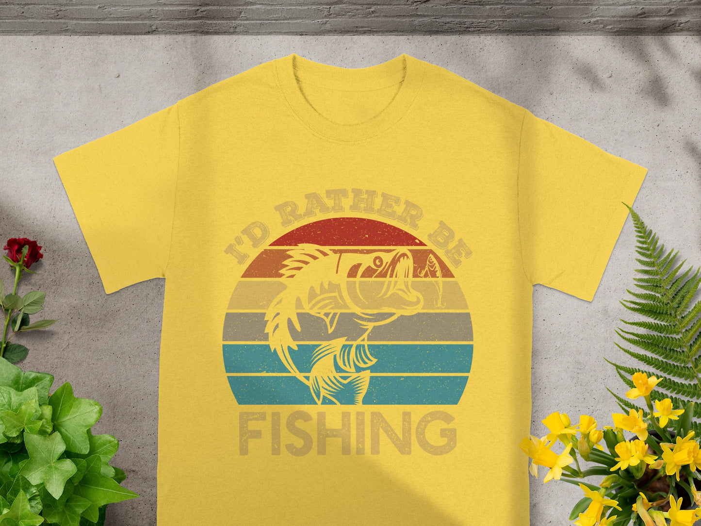Yellow t-shirt with "I'd Rather Be Fishing" text and a jumping fish graphic.