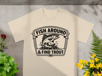 T-shirt with black graphic of a leaping trout and text "FISH AROUND & FIND TROUT".