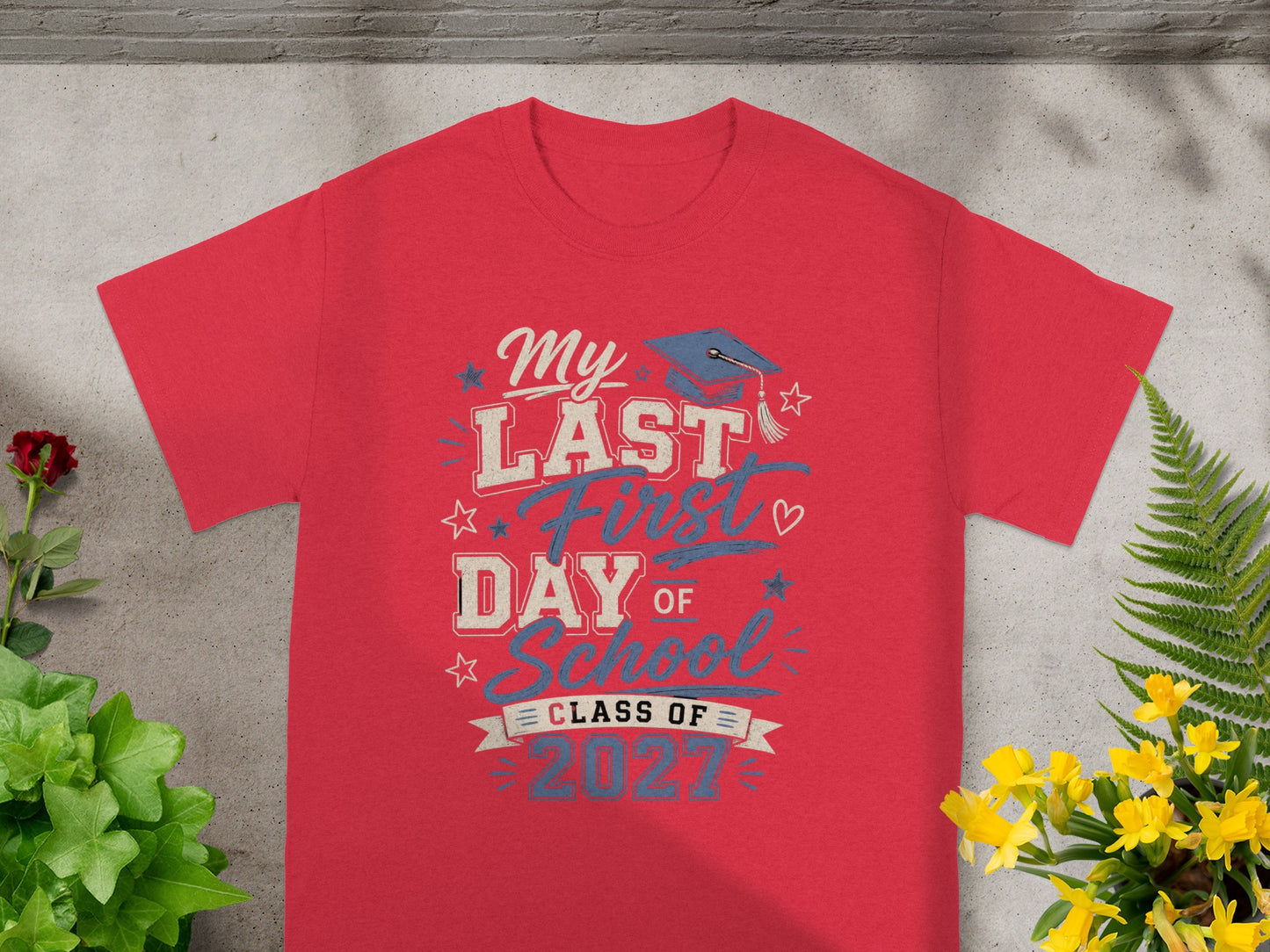 Red t-shirt with "My Last First Day Of School Class Of 2027" text and graduation cap.