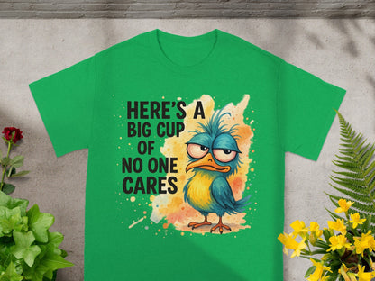 Green t-shirt with grumpy bird and text: "Here's a big cup of no one cares".