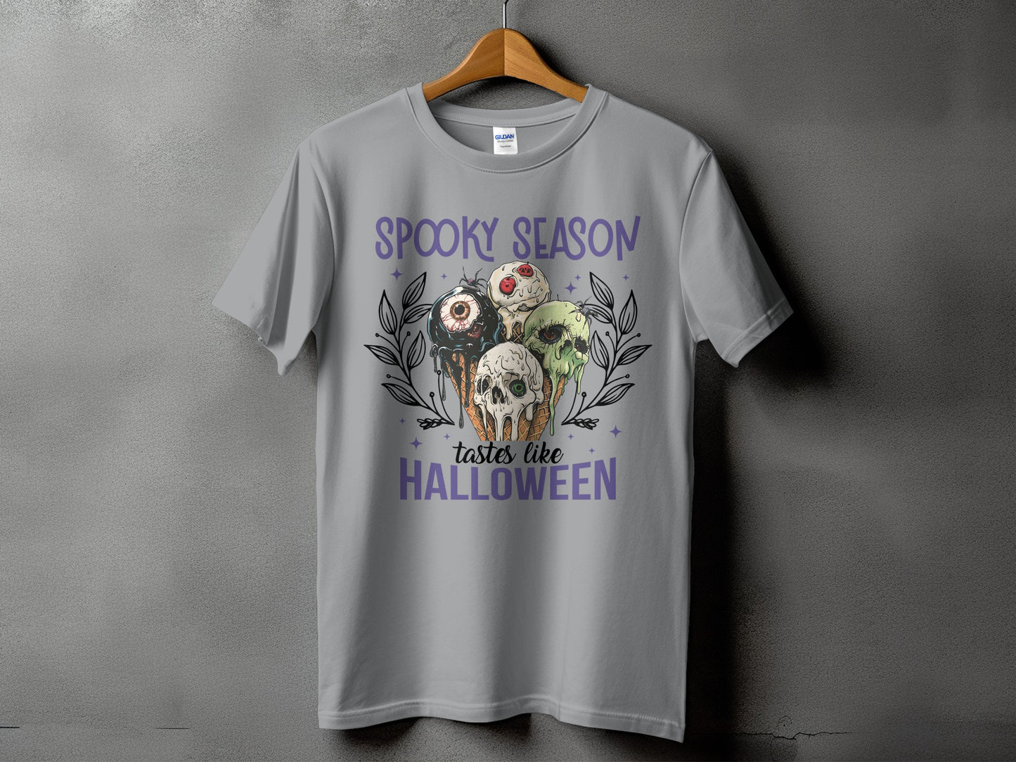 Grey t-shirt with "Spooky Season tastes like Halloween" and creepy ice cream cones.
