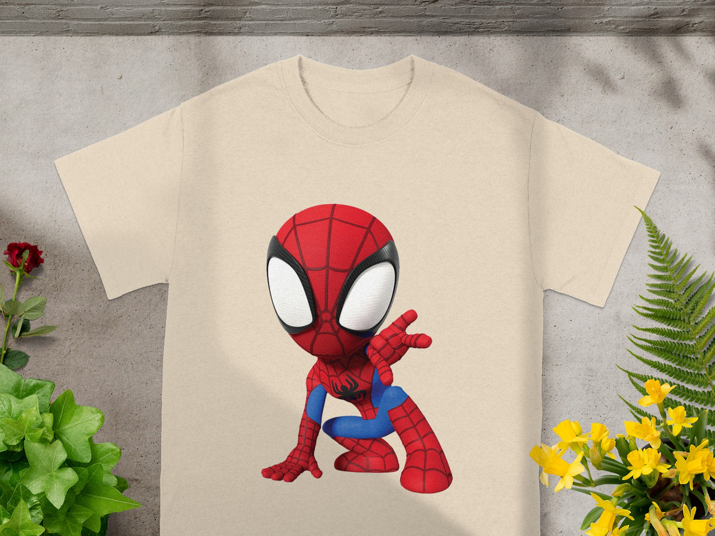 Beige t-shirt with a chibi Spider-Man graphic on the front.