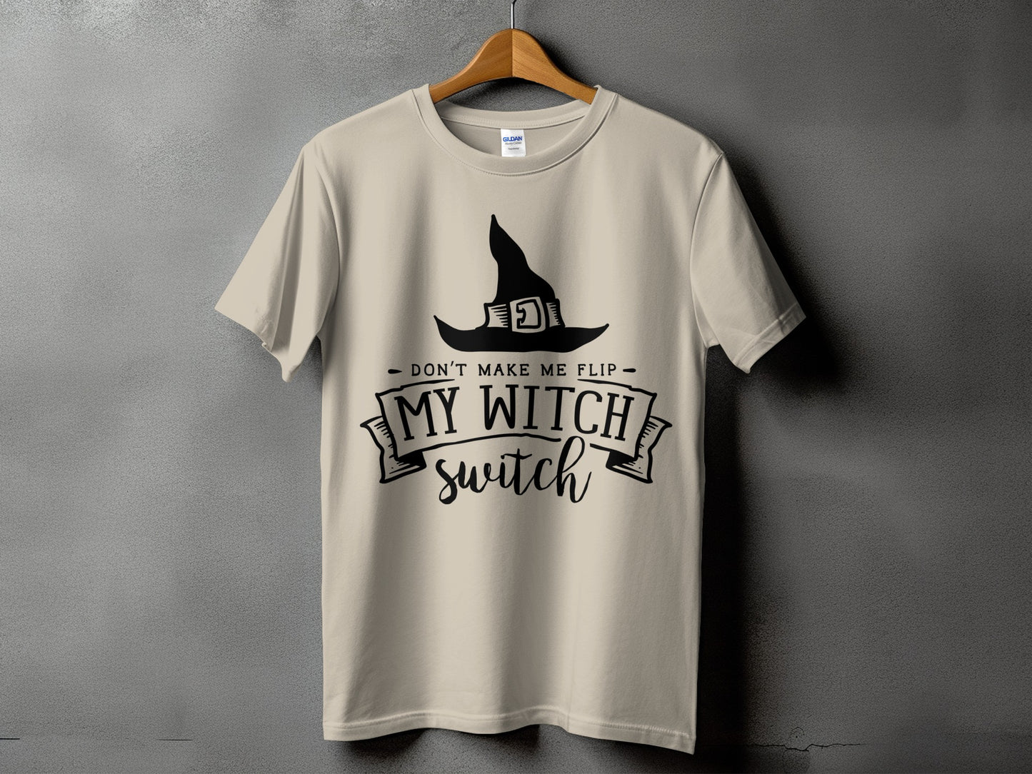 Tan t-shirt with black witch hat and "Don't make me flip my witch switch" text.