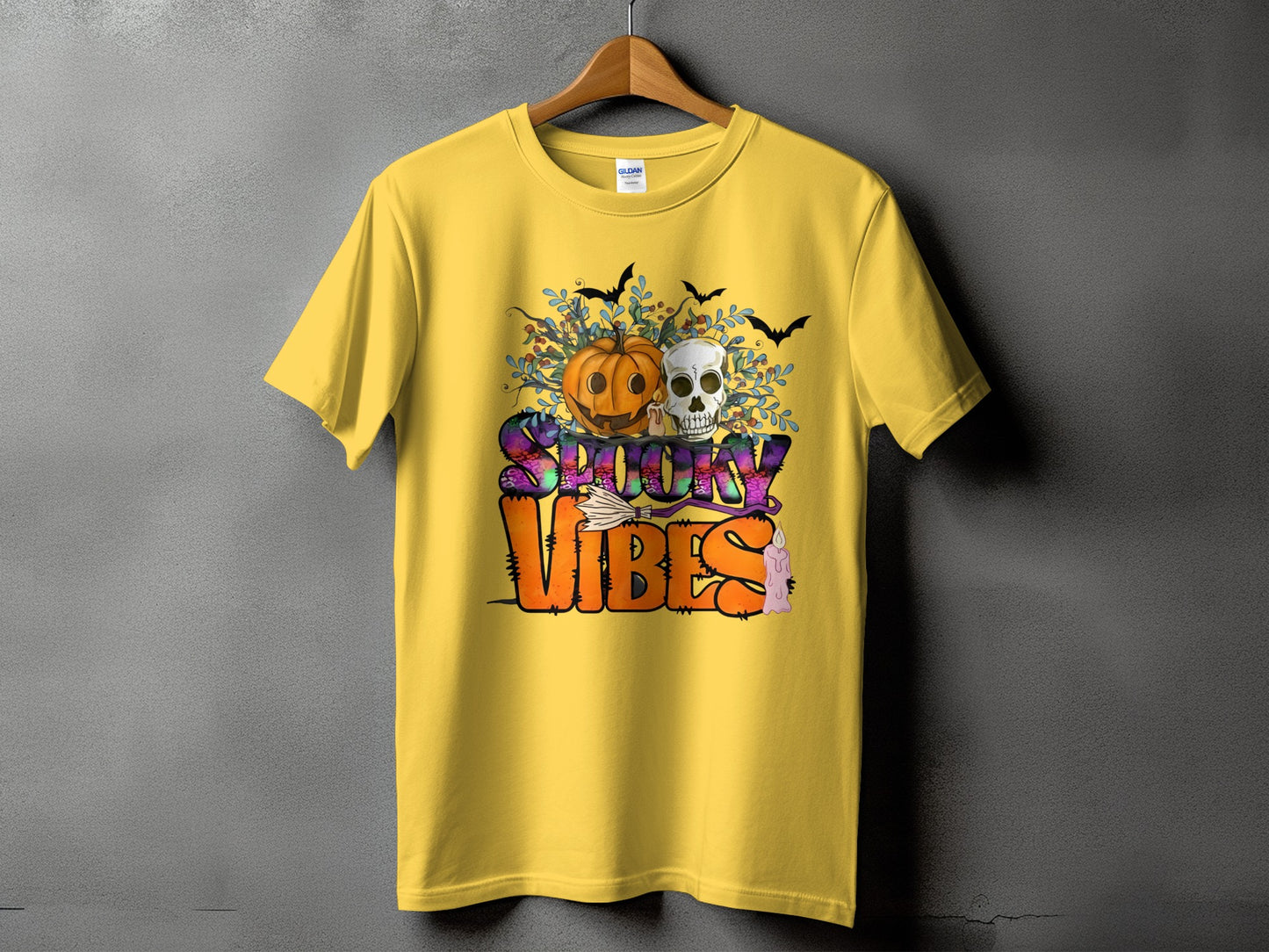 Yellow t-shirt with "Spooky Vibes" text and Halloween imagery.