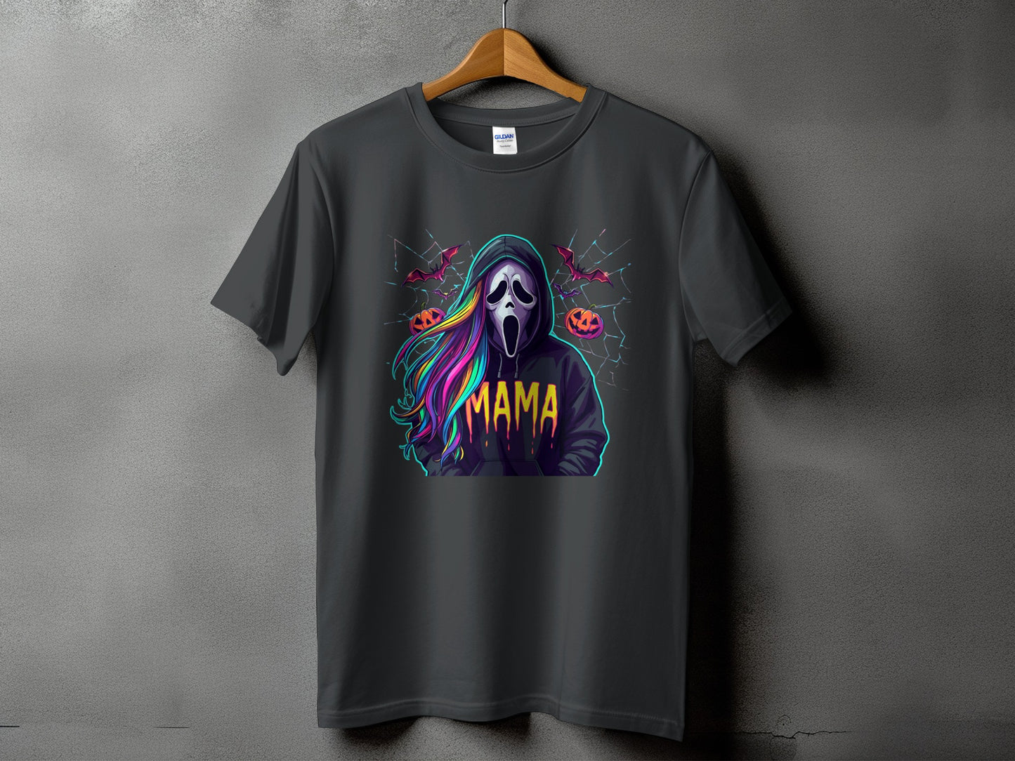 Dark grey t-shirt with "MAMA" and a spooky ghost graphic with colorful hair.