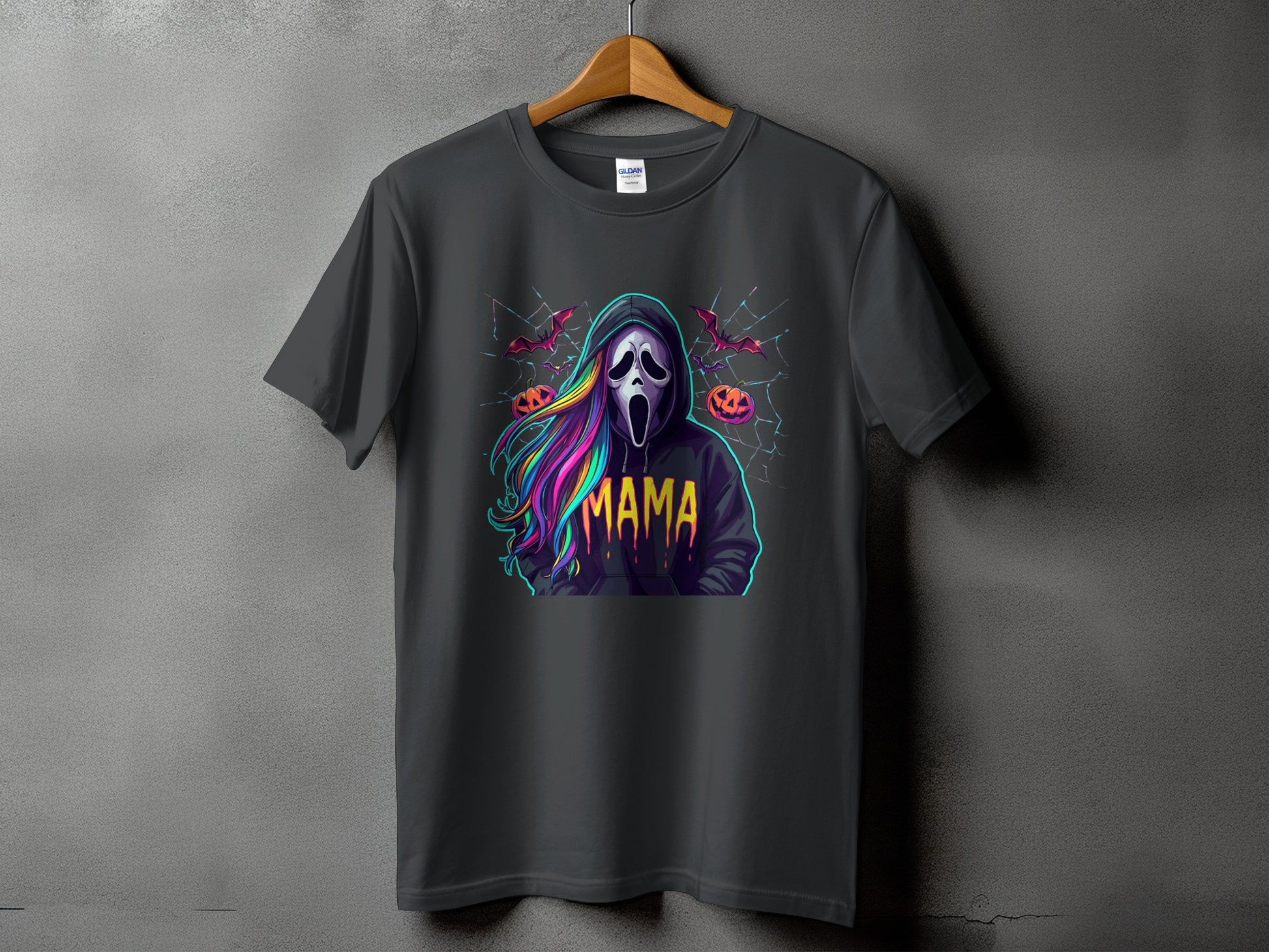 Dark grey t-shirt with "MAMA" and a spooky ghost graphic with colorful hair.