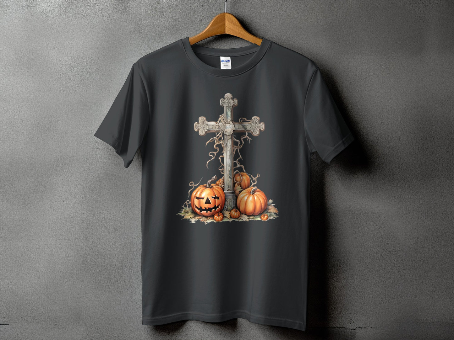 Dark gray t-shirt with a Halloween cross and pumpkins graphic design.