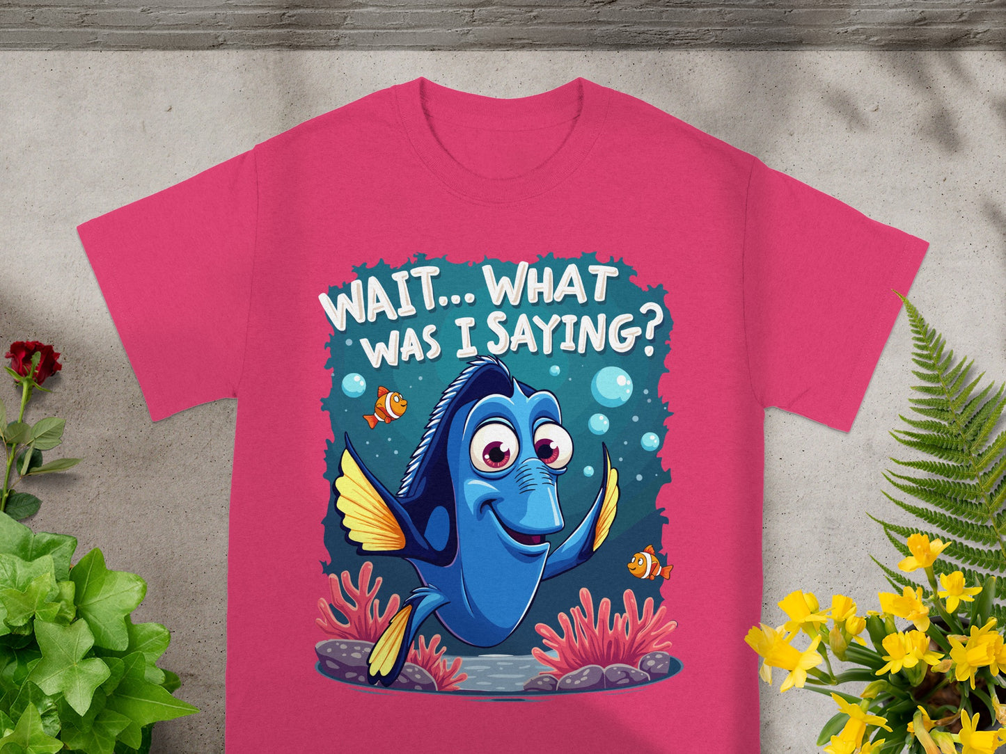 Pink t-shirt with Dory from Finding Nemo saying "Wait... What Was I Saying?".