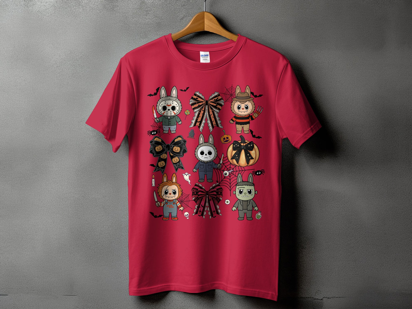 Red t-shirt with a Halloween-themed graphic featuring cartoon characters and bows.
