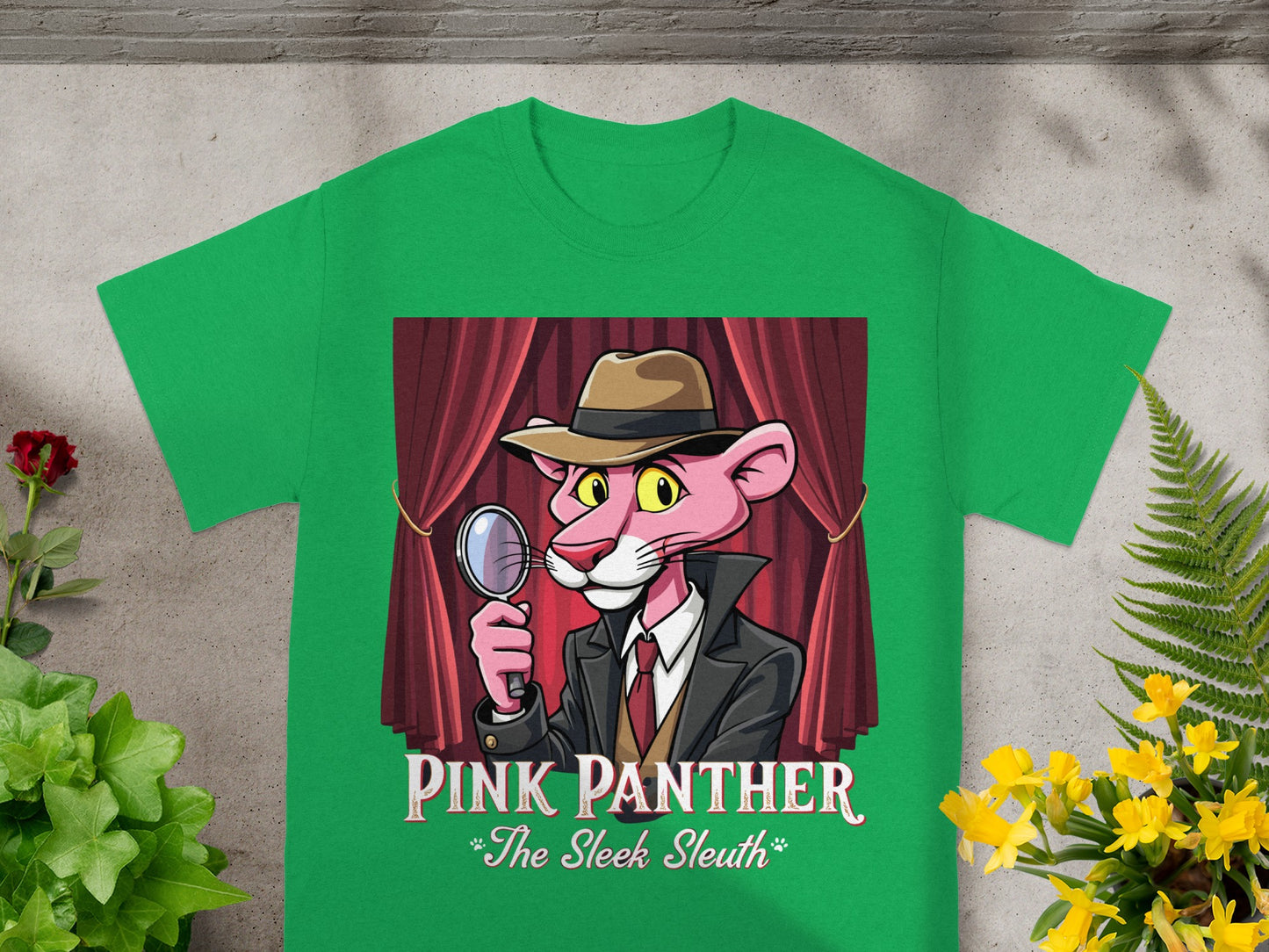 Green t-shirt with Pink Panther in detective outfit holding a magnifying glass.