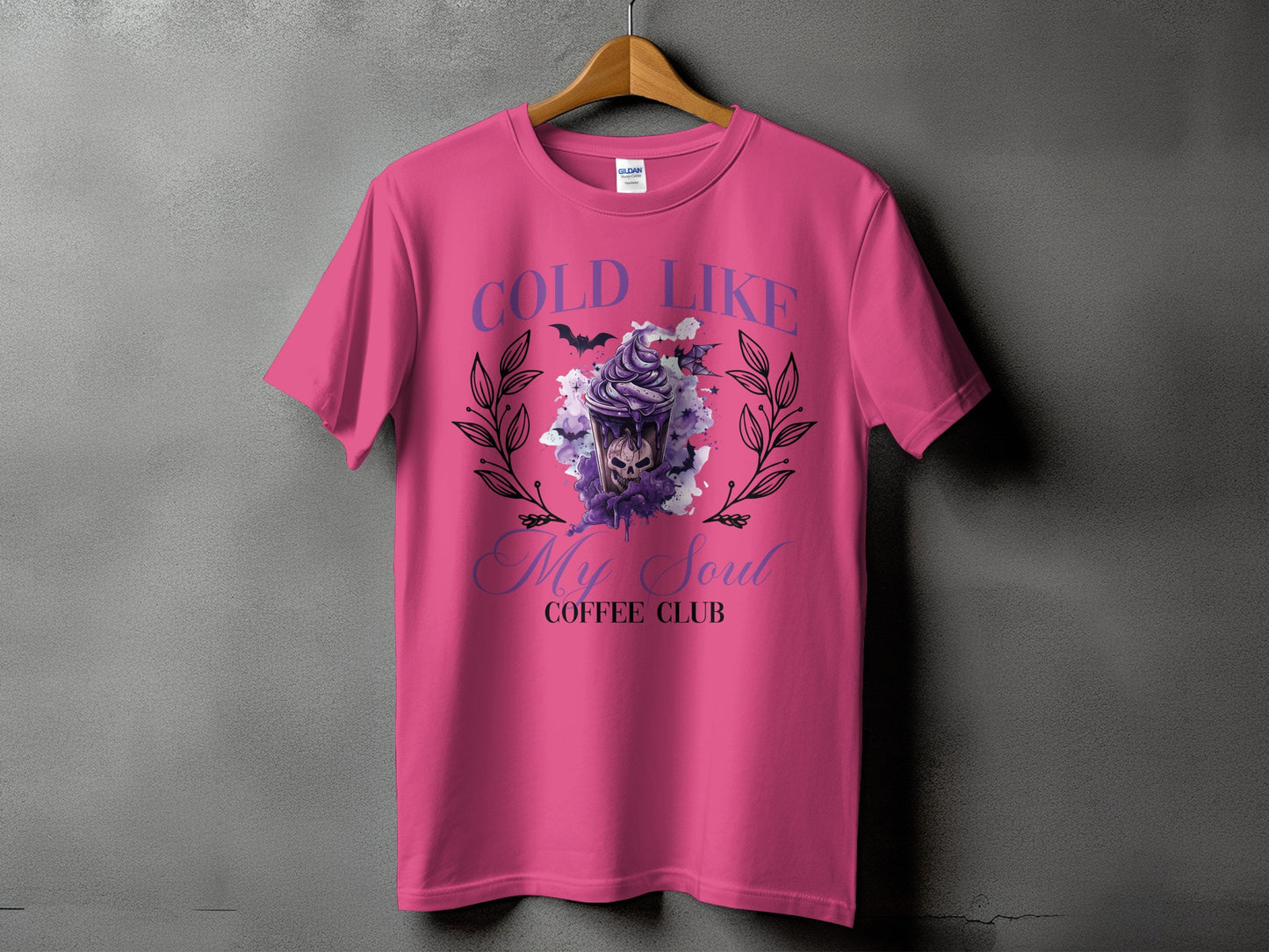 Pink t-shirt with "COLD LIKE My Soul COFFEE CLUB" text and skull graphic.