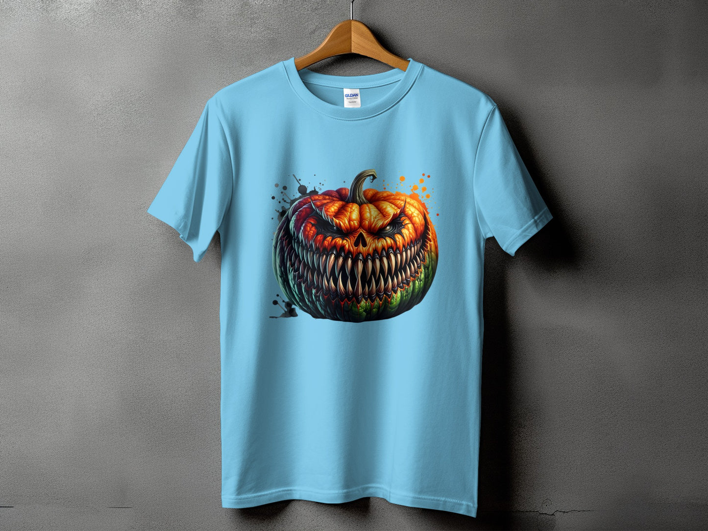 Light blue t-shirt with a detailed, scary jack-o'-lantern graphic and black splatter.