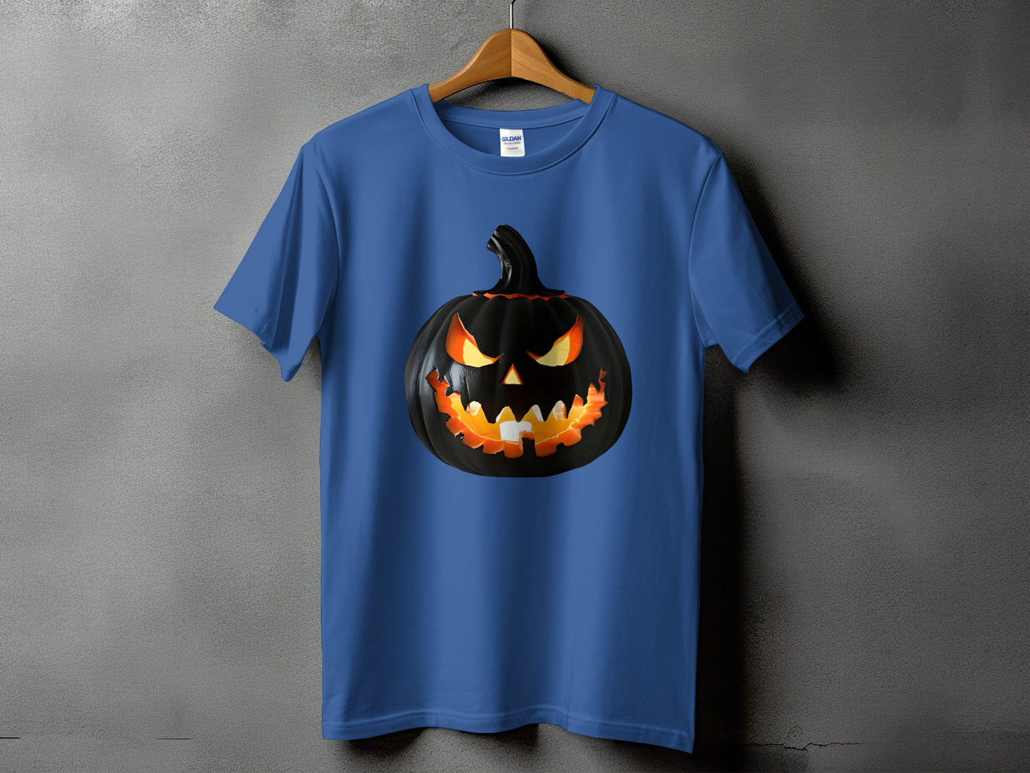 Blue t-shirt with a black jack-o'-lantern graphic on the front.