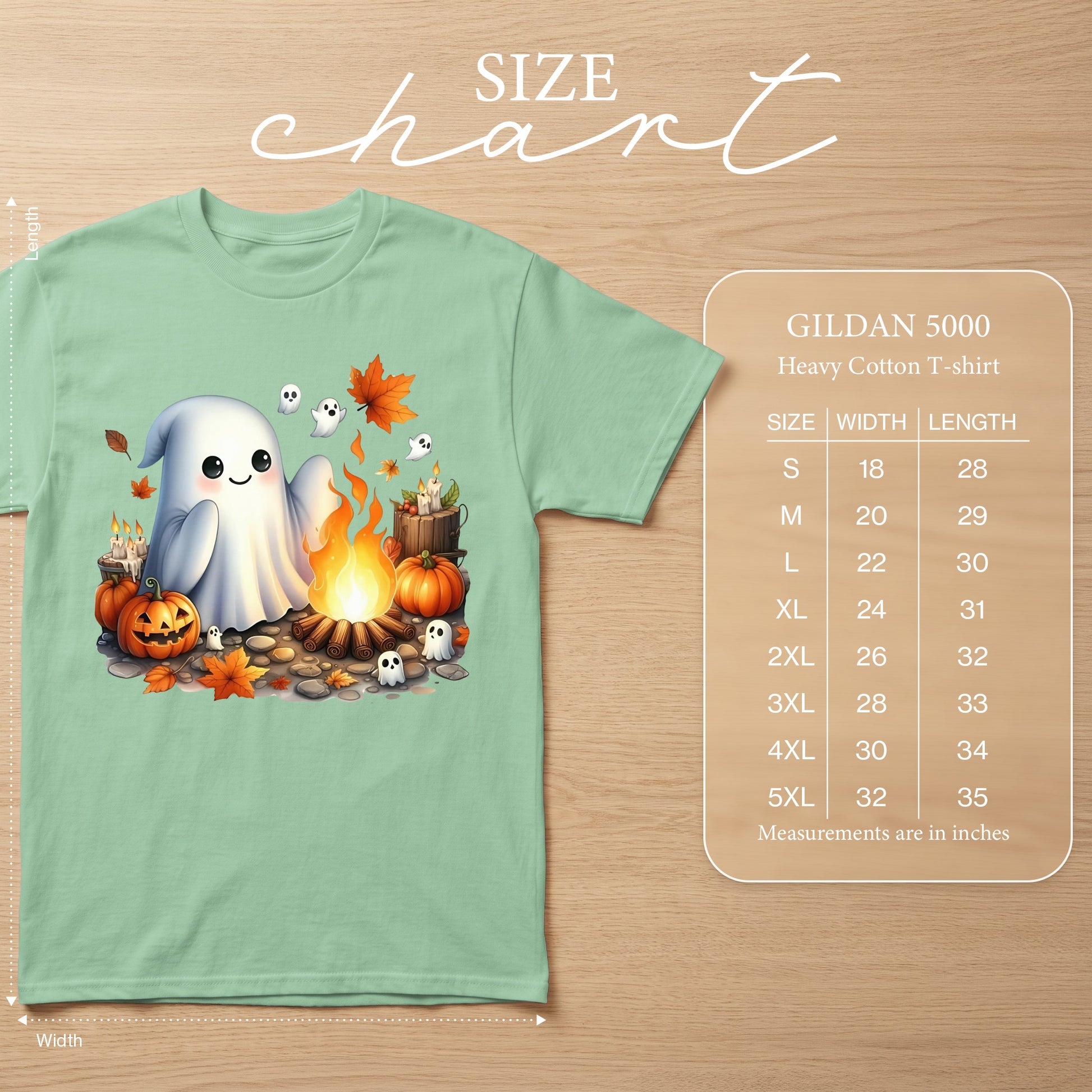 Mint green t-shirt with a cute ghost and campfire Halloween graphic and Gildan 5000 size chart.