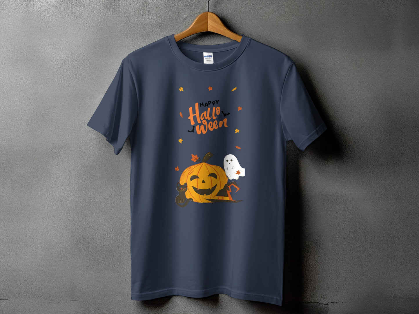 Dark blue t-shirt with "Happy Halloween" text, a smiling jack-o'-lantern, black cat, ghost, and hat.