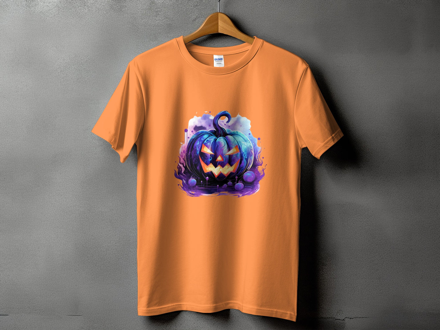 Orange t-shirt with a spooky, glowing blue jack-o'-lantern design.