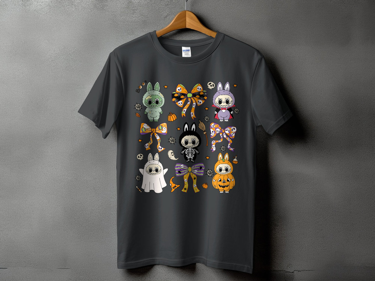 Dark gray t-shirt with a collage of cute Halloween characters and bows.