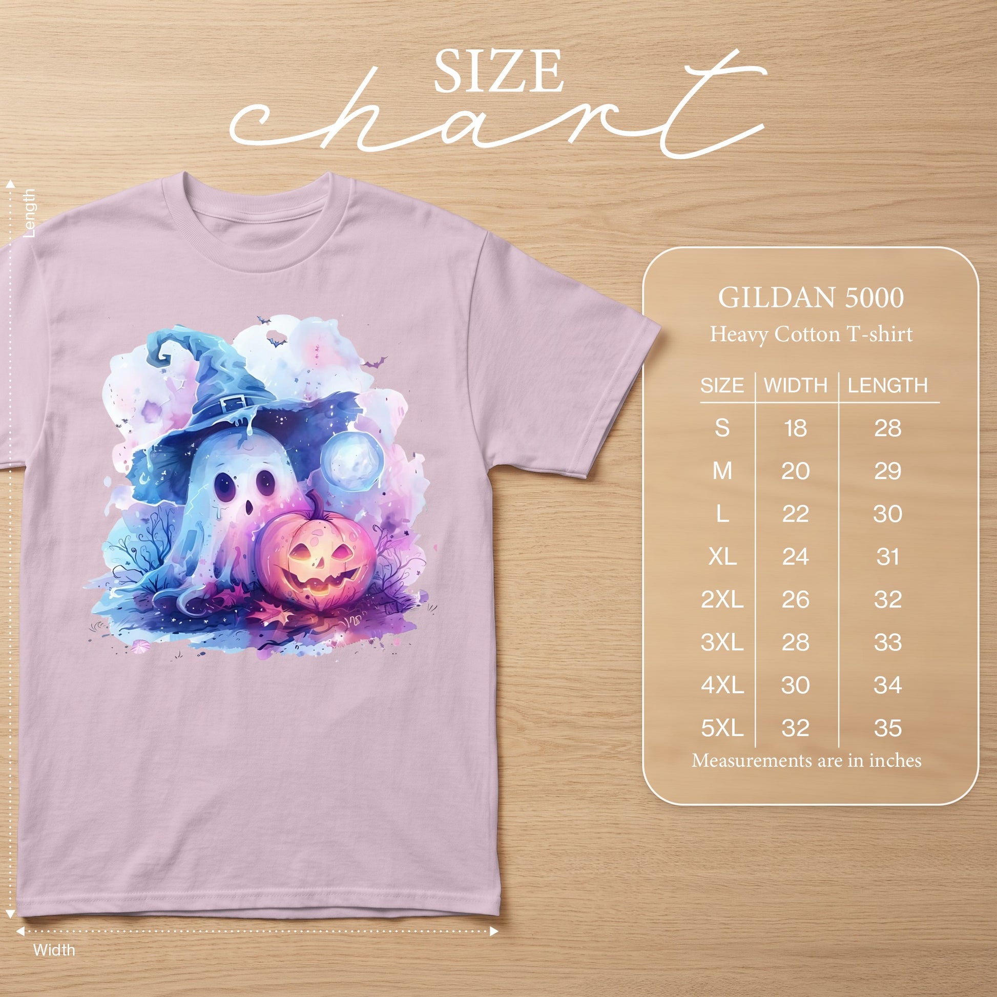 Pink Gildan 5000 Heavy Cotton T-shirt with a ghost and pumpkin Halloween graphic.