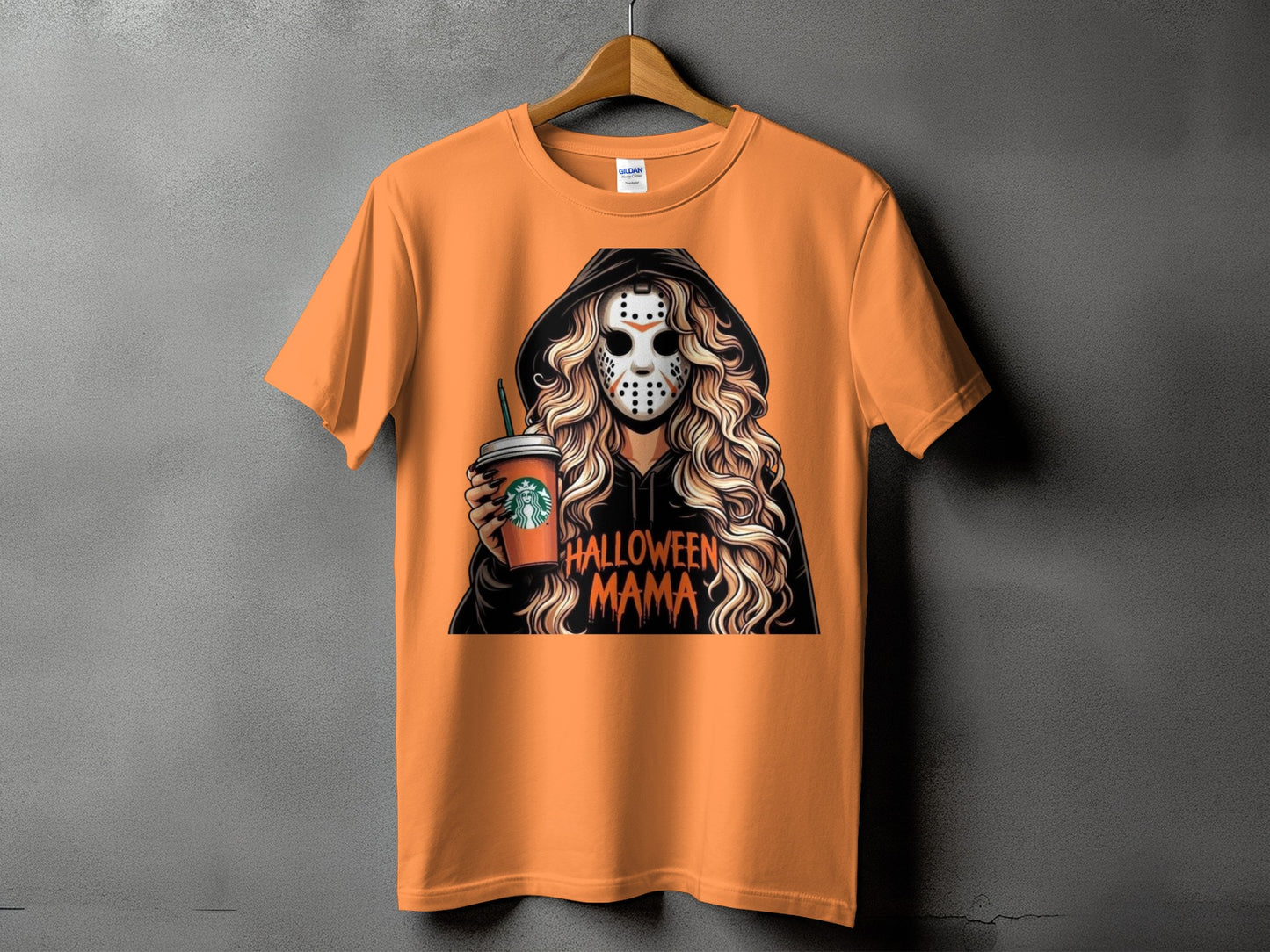 Orange t-shirt graphic of a person in a hockey mask holding a coffee cup, text Halloween Mama.