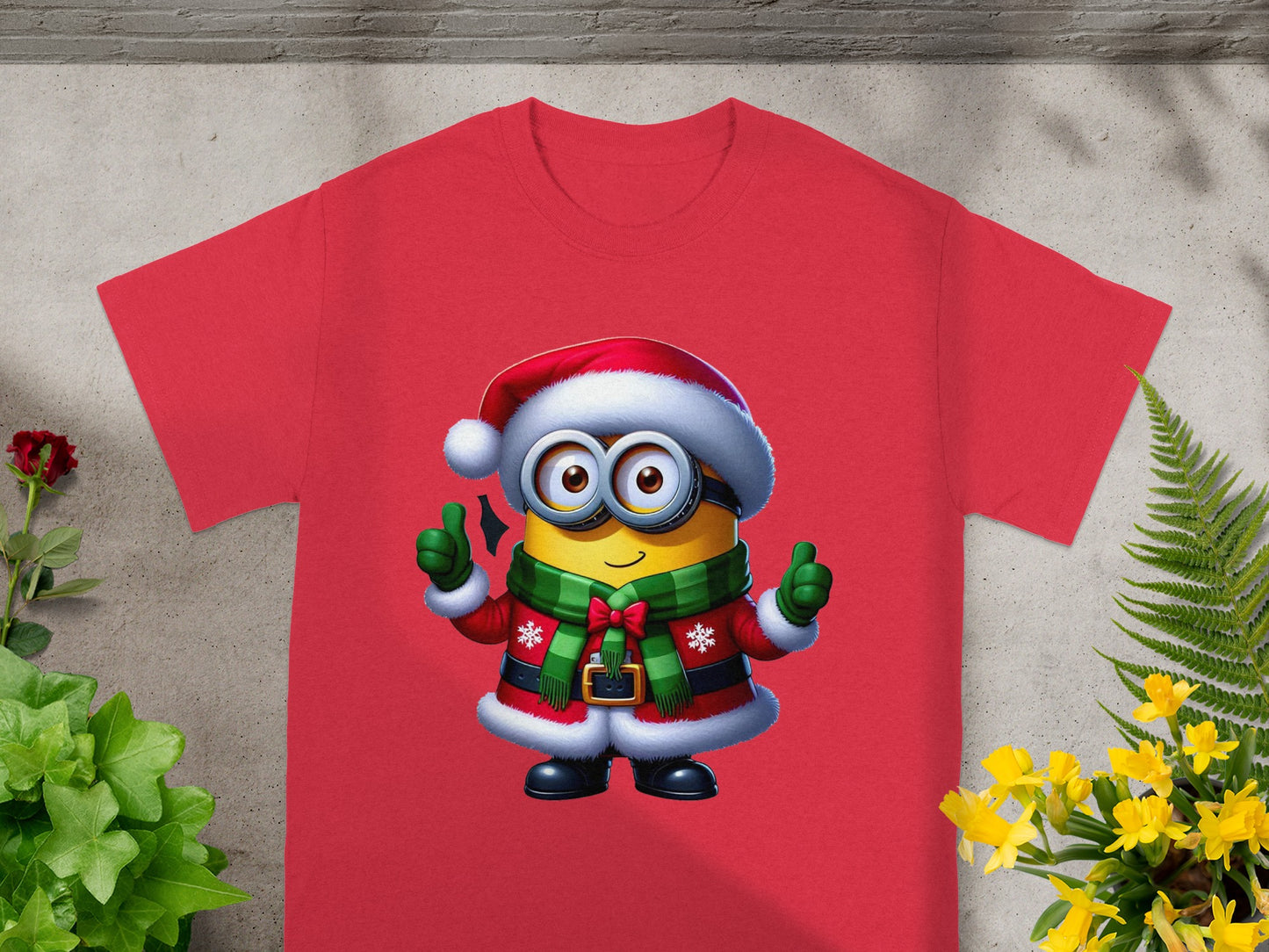Red t-shirt with a Minion character in a Santa hat and Christmas outfit.