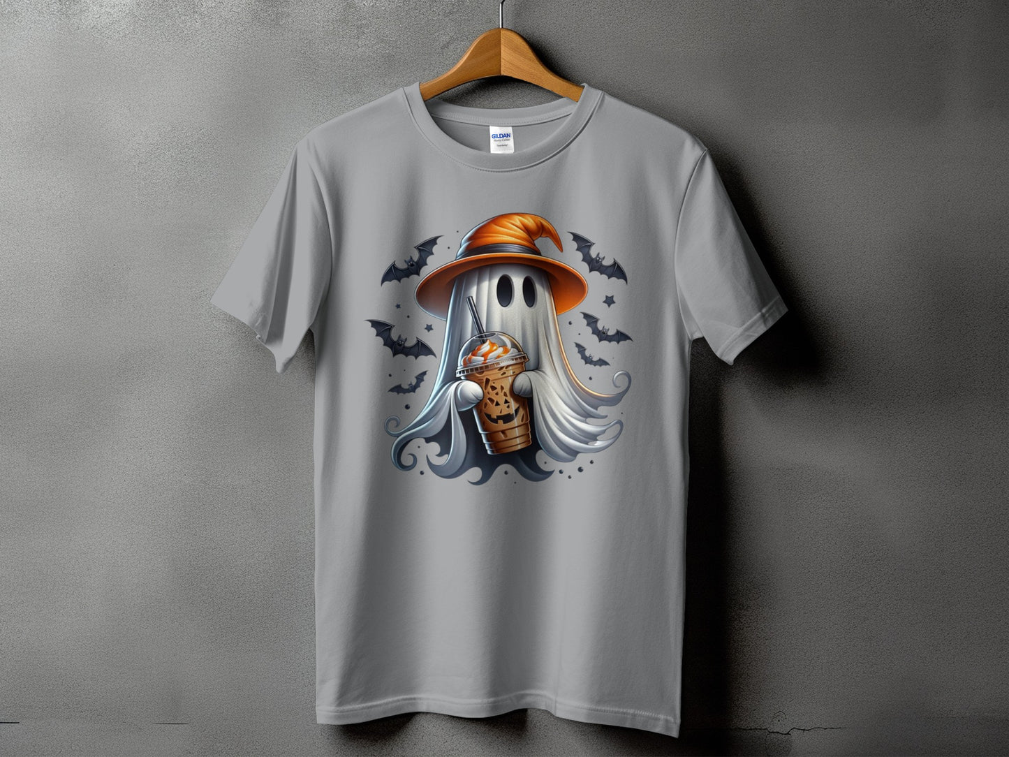Ghost wearing witch hat holds pumpkin spice latte surrounded by bats and stars.