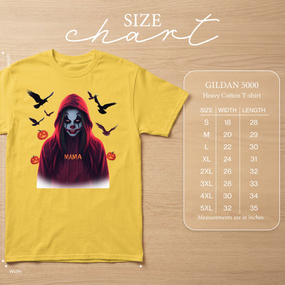 Yellow t-shirt with spooky clown graphic, birds, and pumpkins. Includes size chart.